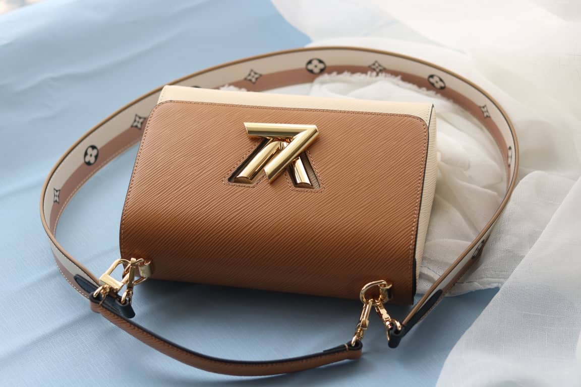 Louis Vuitton Textured Epi Leather Twist Series Bag Brown