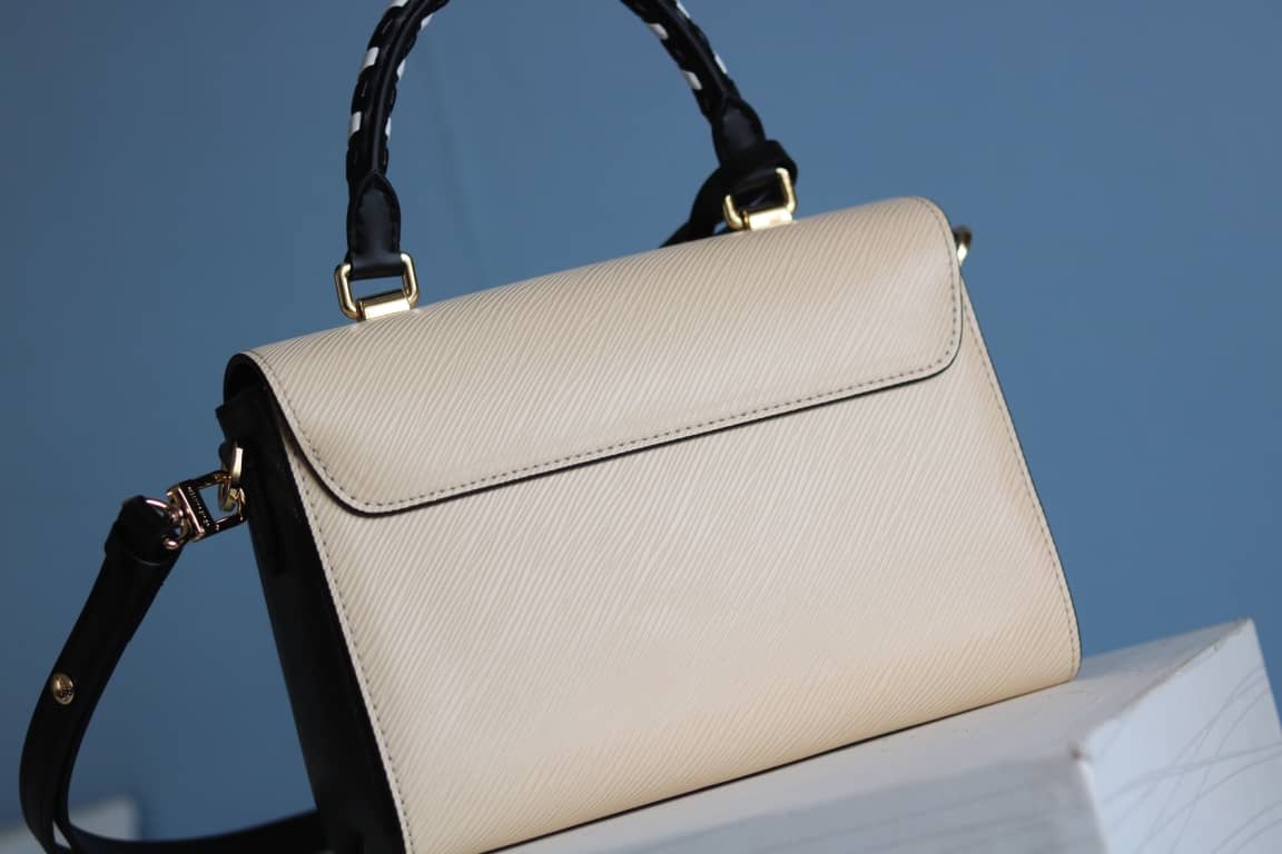 Louis Vuitton Textured Epi Leather Twist Series Bag Beige