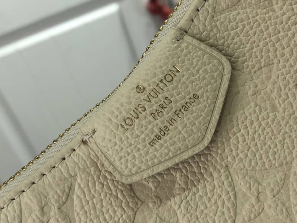 Louis Vuitton Easy Pouch On Strap Creme White Empreinte M81066 Replica
