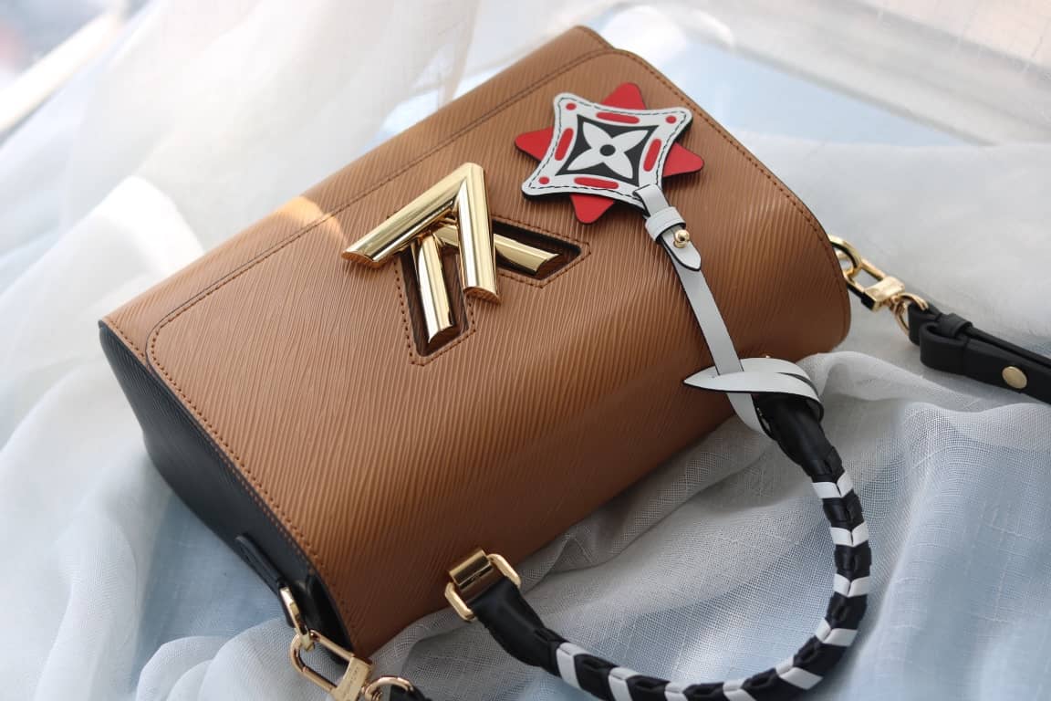 Louis Vuitton Textured Epi Leather Twist Series Bag Brown