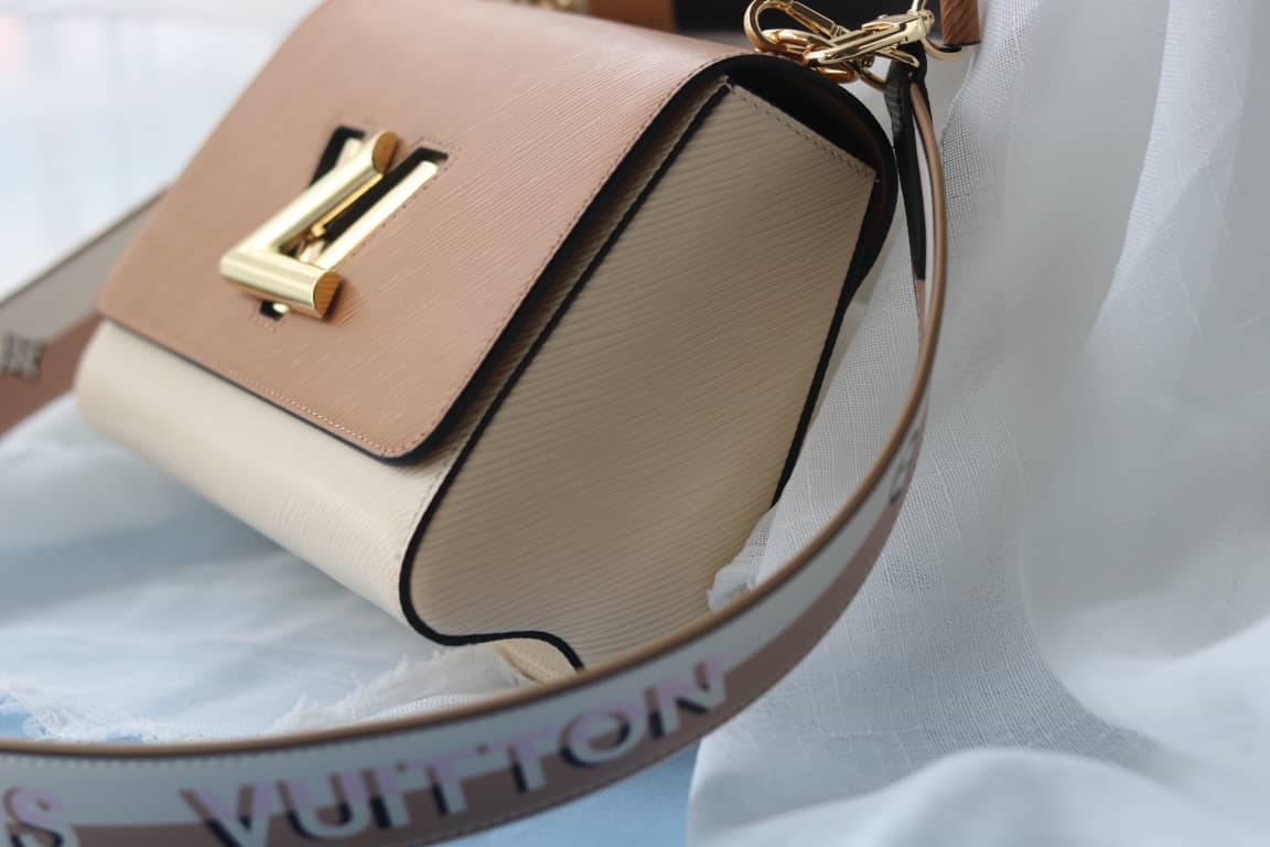 Louis Vuitton Textured Epi Leather Twist Series Bag Brown