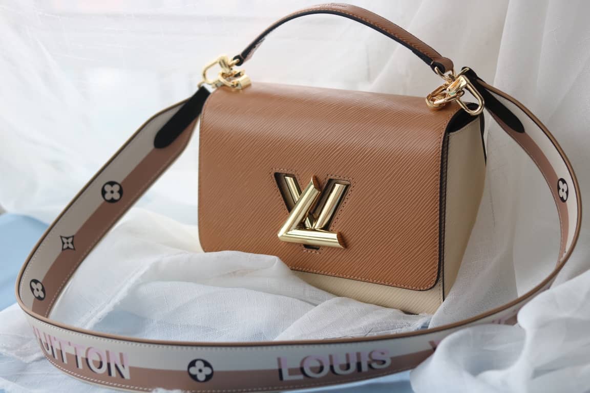 Louis Vuitton Textured Epi Leather Twist Series Bag Brown