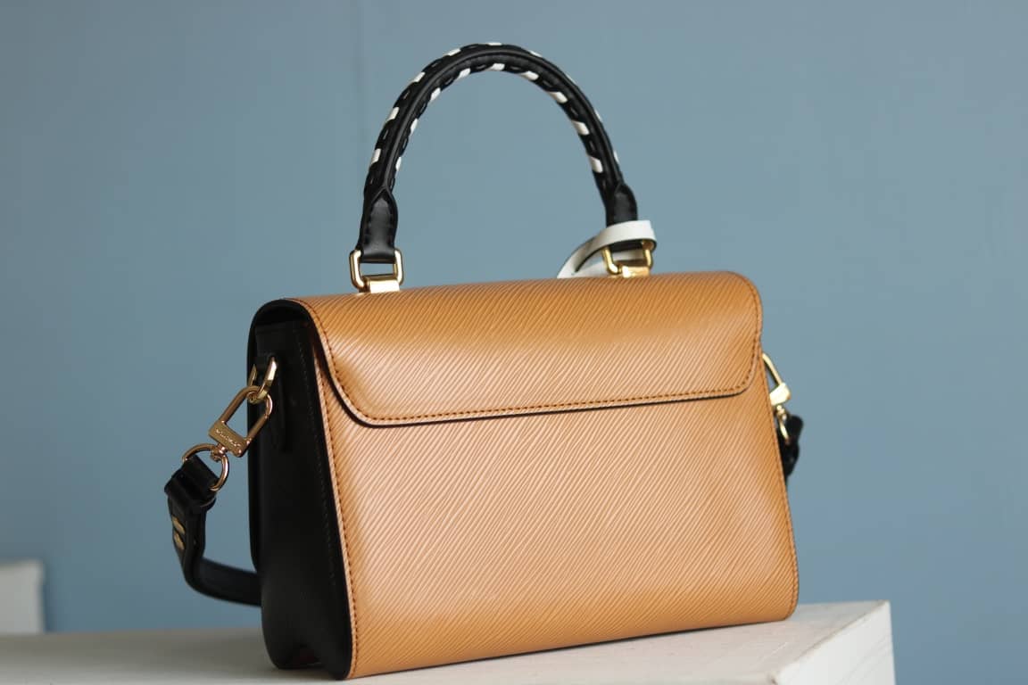 Louis Vuitton Textured Epi Leather Twist Series Bag Brown