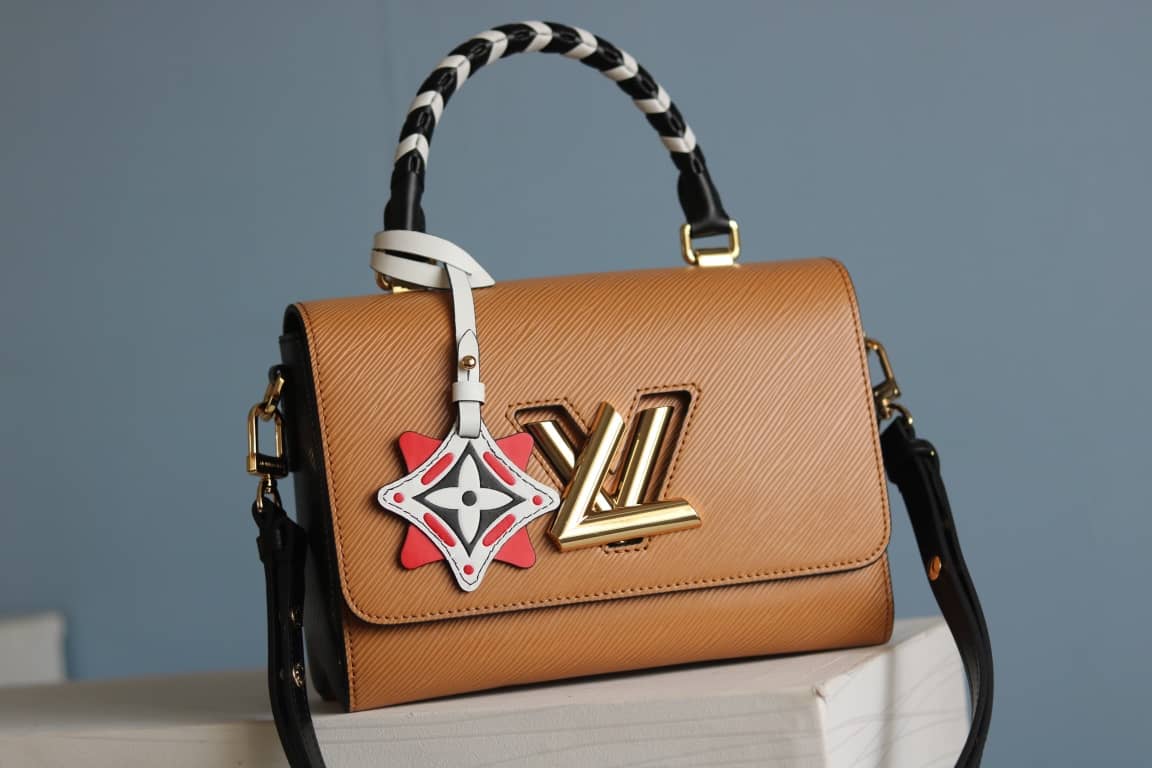 Louis Vuitton Textured Epi Leather Twist Series Bag Brown