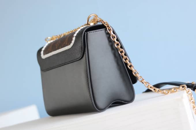 Louis Vuitton Textured Epi Leather Twist Series Bag