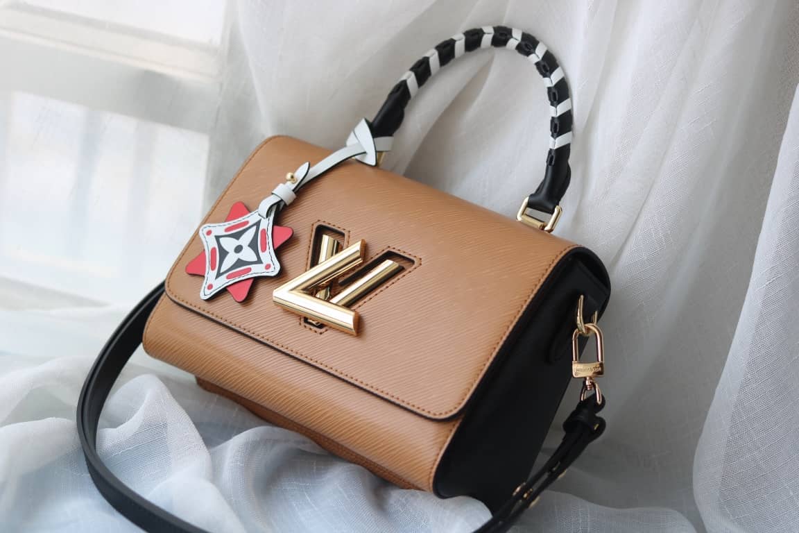 Louis Vuitton Textured Epi Leather Twist Series Bag Brown