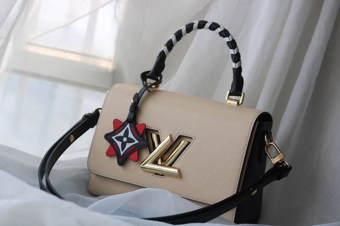 Louis Vuitton Textured Epi Leather Twist Series Bag Beige