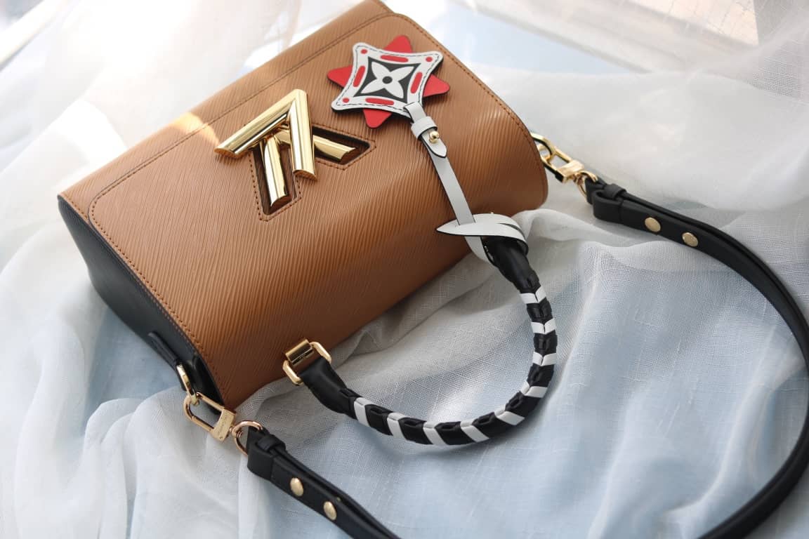 Louis Vuitton Textured Epi Leather Twist Series Bag Brown