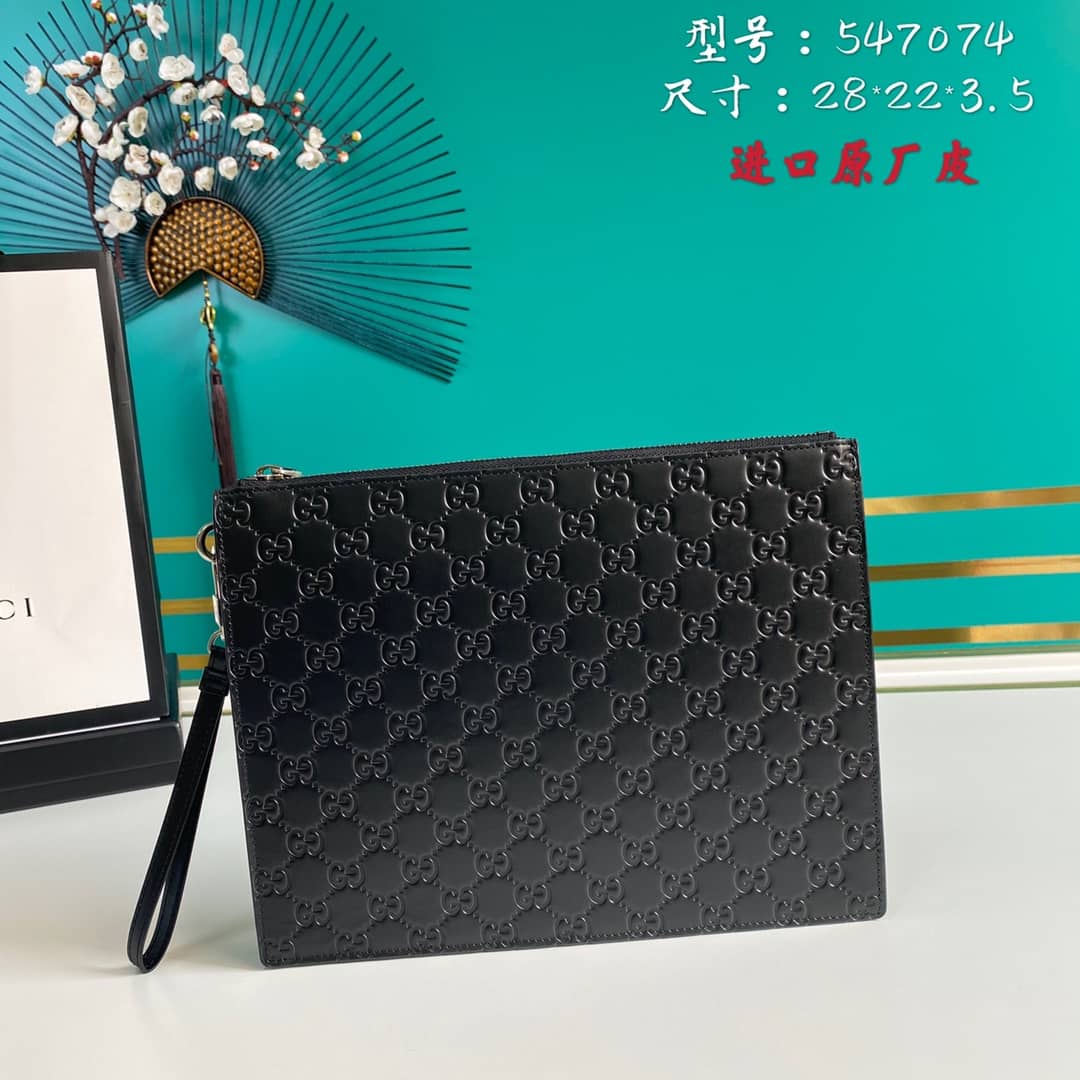 Gucci Embossed Logo Calf Leather Black Pouch 547074