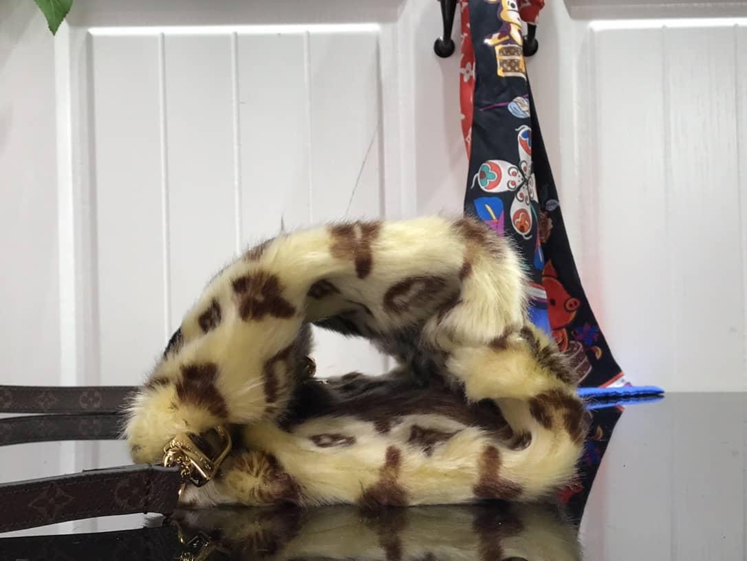 Louis Vuitton In The Winter Muff Replica Bag M76094