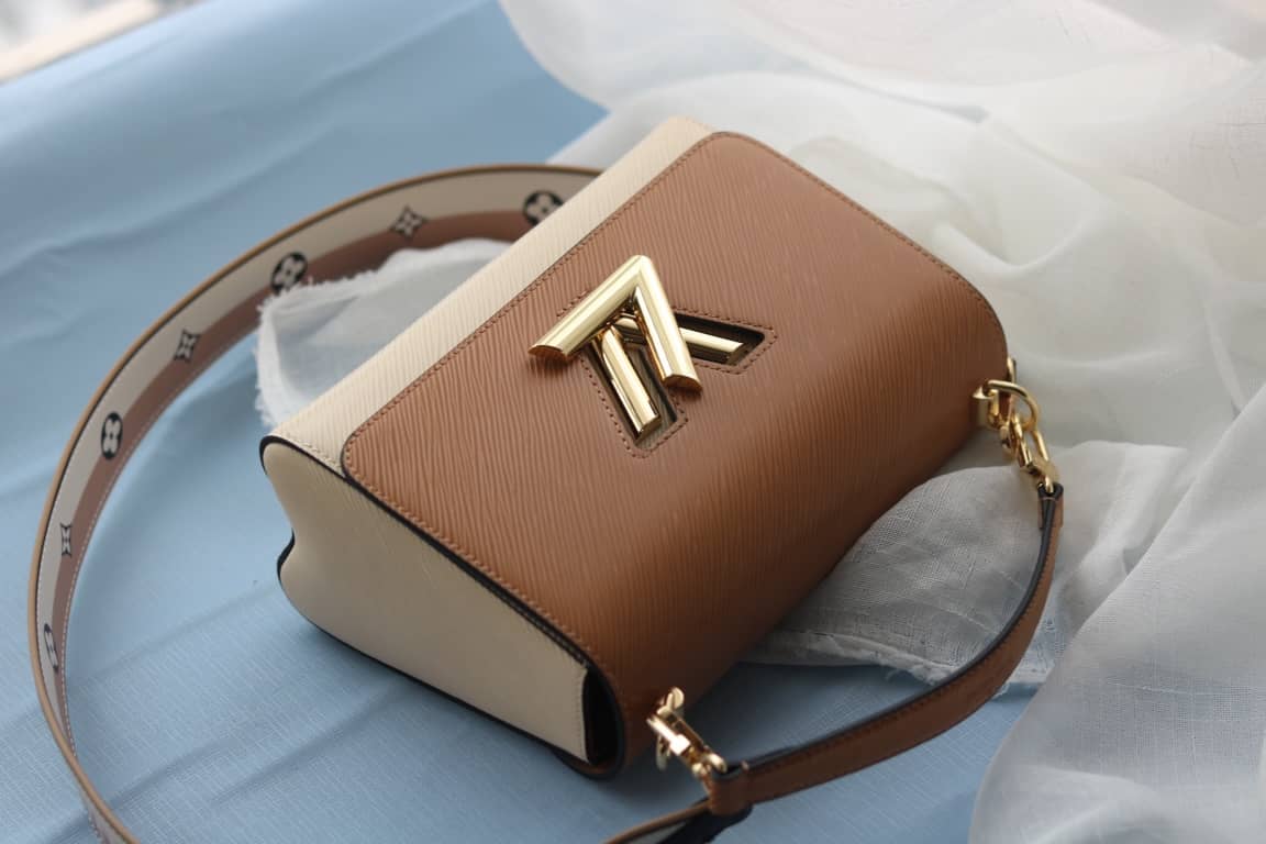 Louis Vuitton Textured Epi Leather Twist Series Bag Brown
