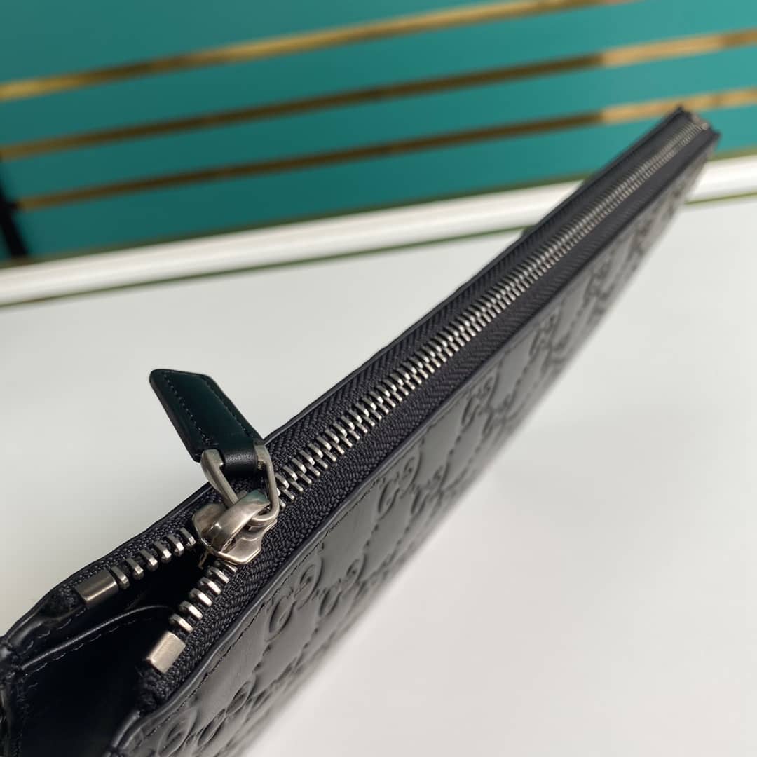Gucci Embossed Logo Calf Leather Black Pouch 547074
