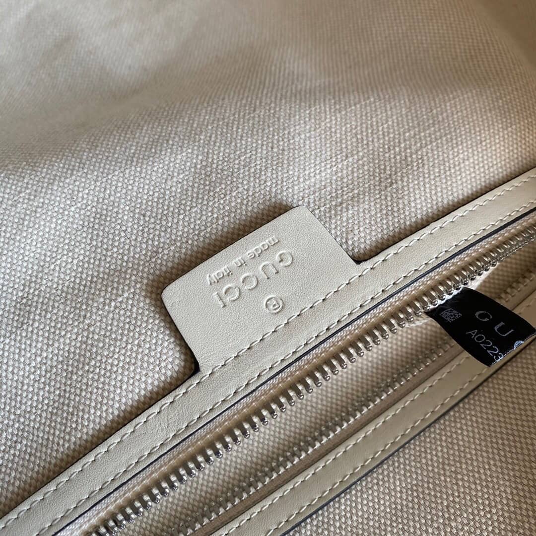 Gucci GG Embossed Perforated Leather Duffle Bag Replica White 625768