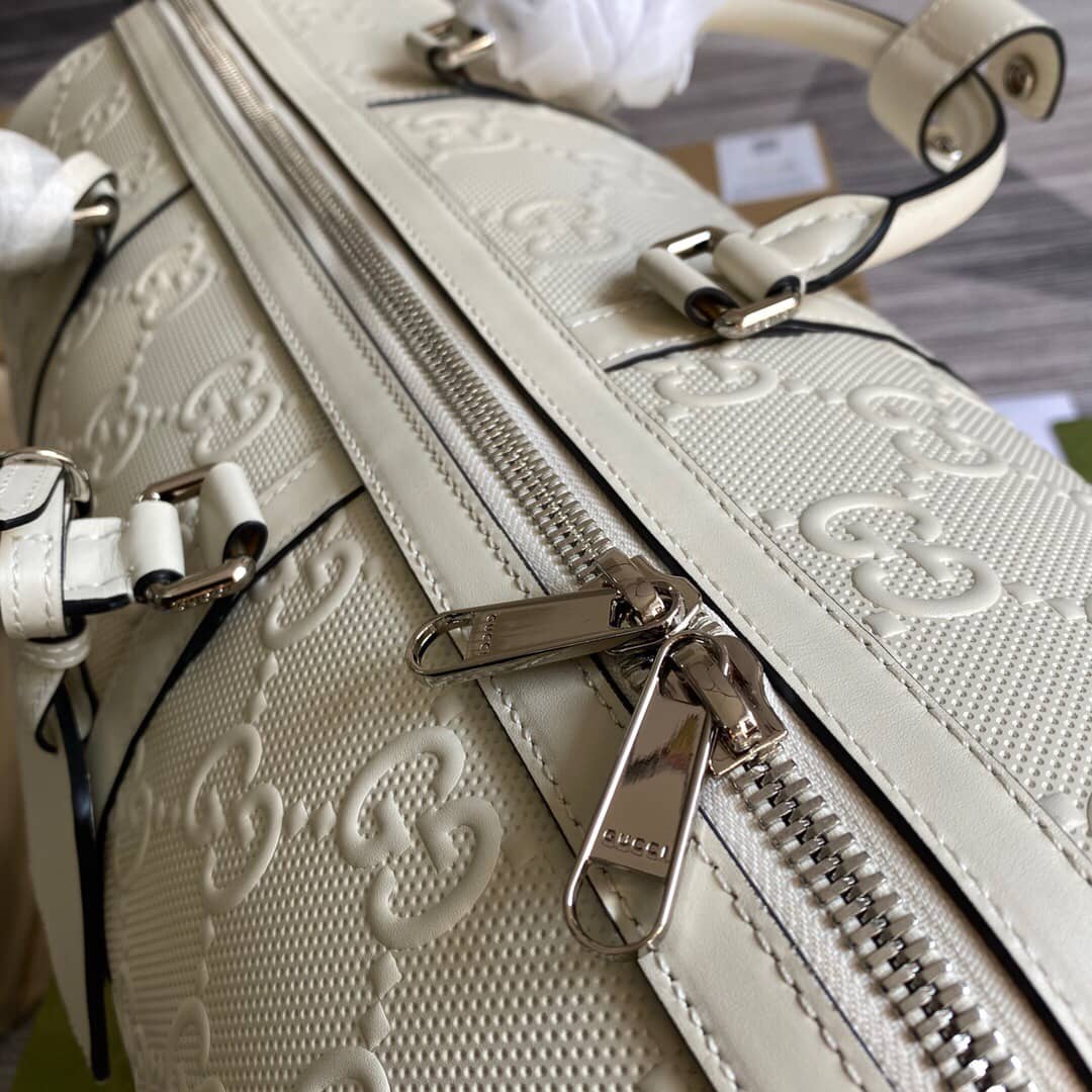 Gucci GG Embossed Perforated Leather Duffle Bag Replica White 625768