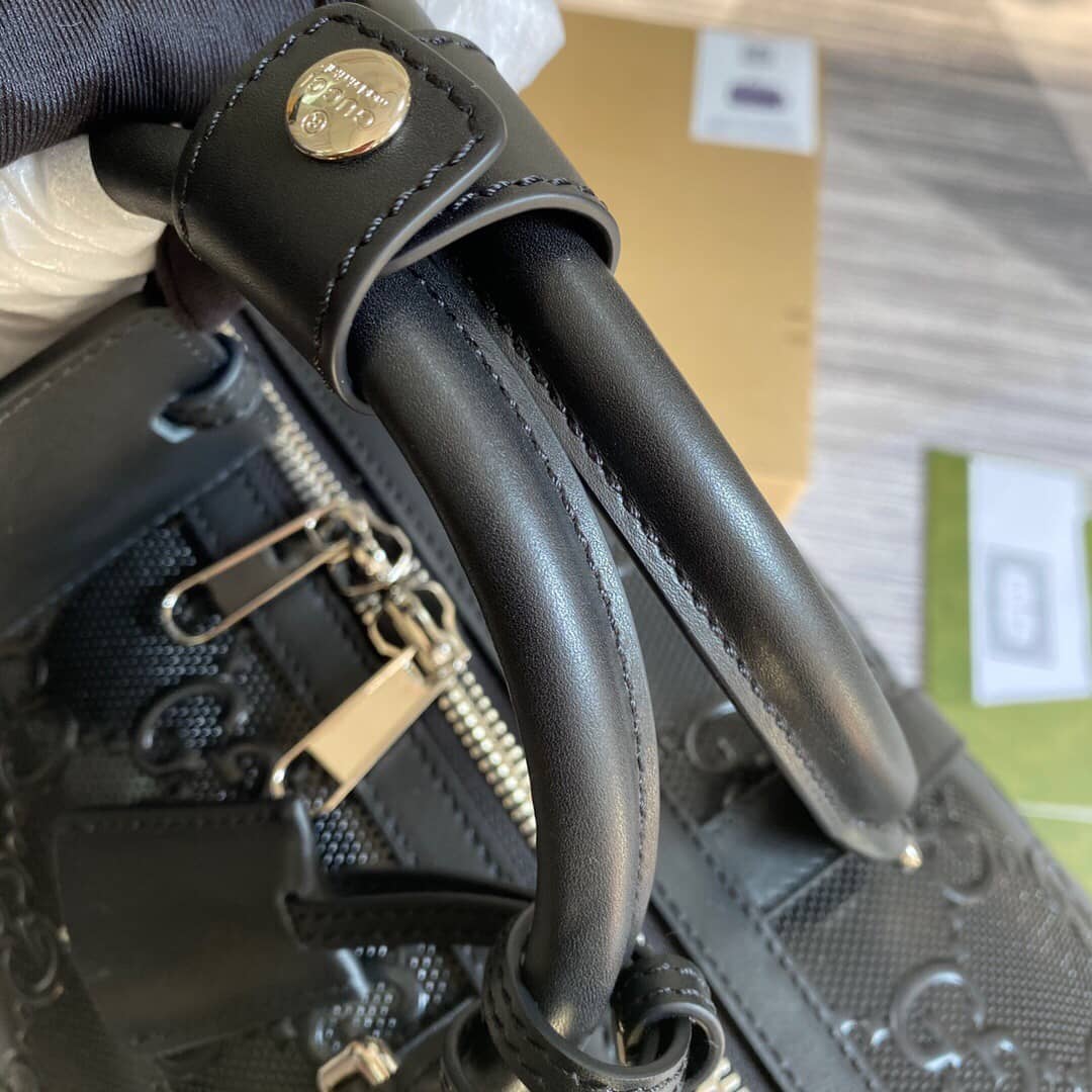 Gucci GG Embossed Perforated Leather Duffle Bag Replica Black 625768