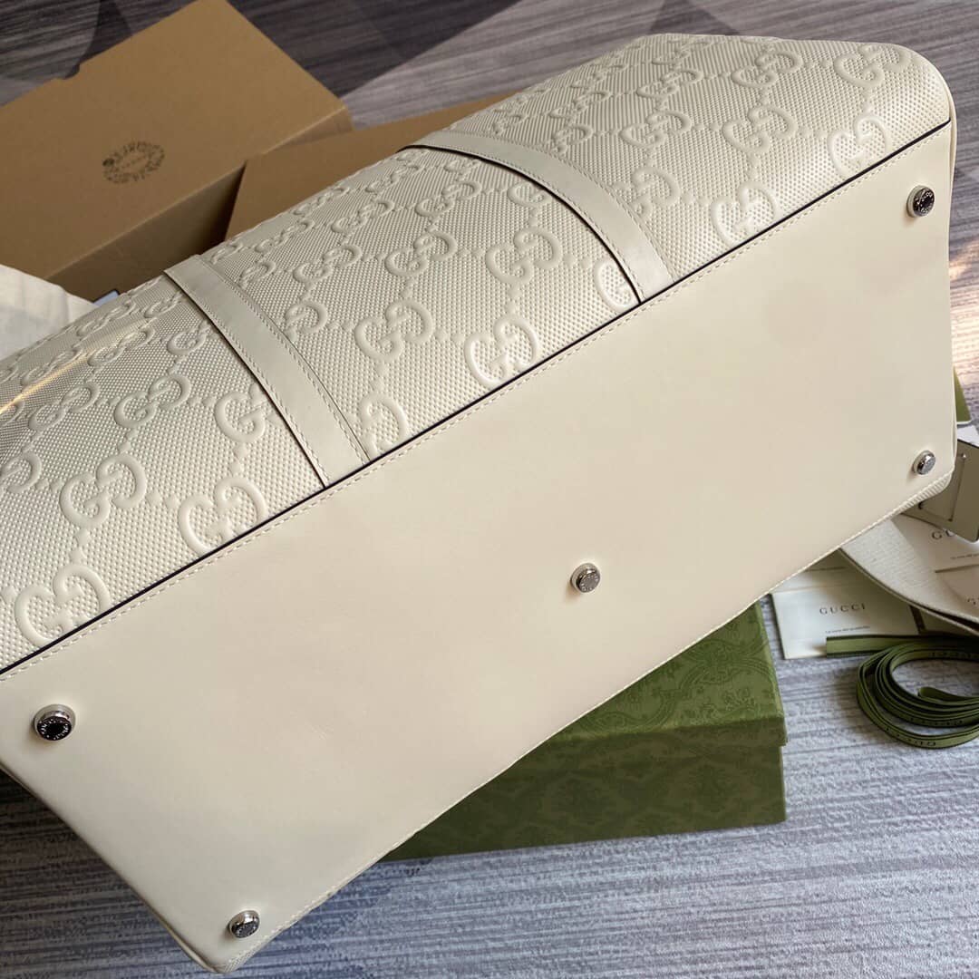 Gucci GG Embossed Perforated Leather Duffle Bag Replica White 625768