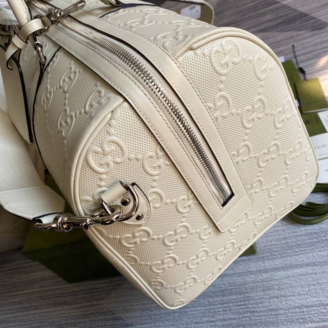 Gucci GG Embossed Perforated Leather Duffle Bag Replica White 625768