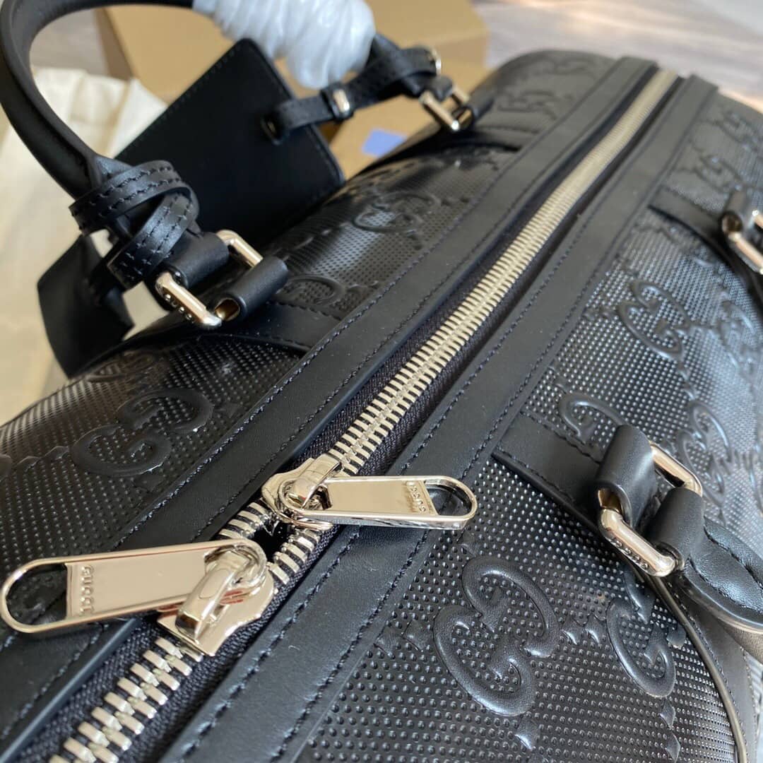 Gucci GG Embossed Perforated Leather Duffle Bag Replica Black 625768