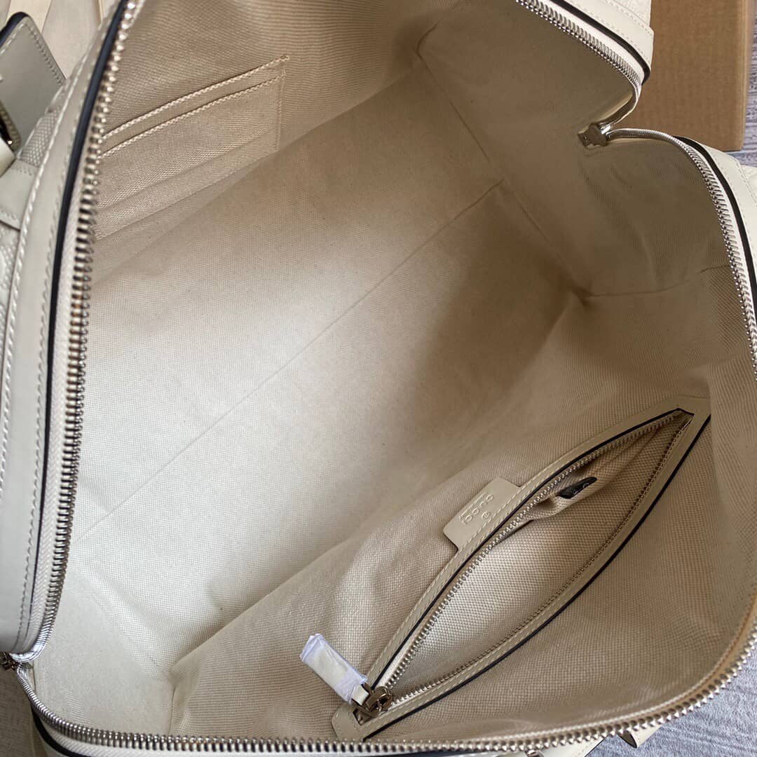 Gucci GG Embossed Perforated Leather Duffle Bag Replica White 625768