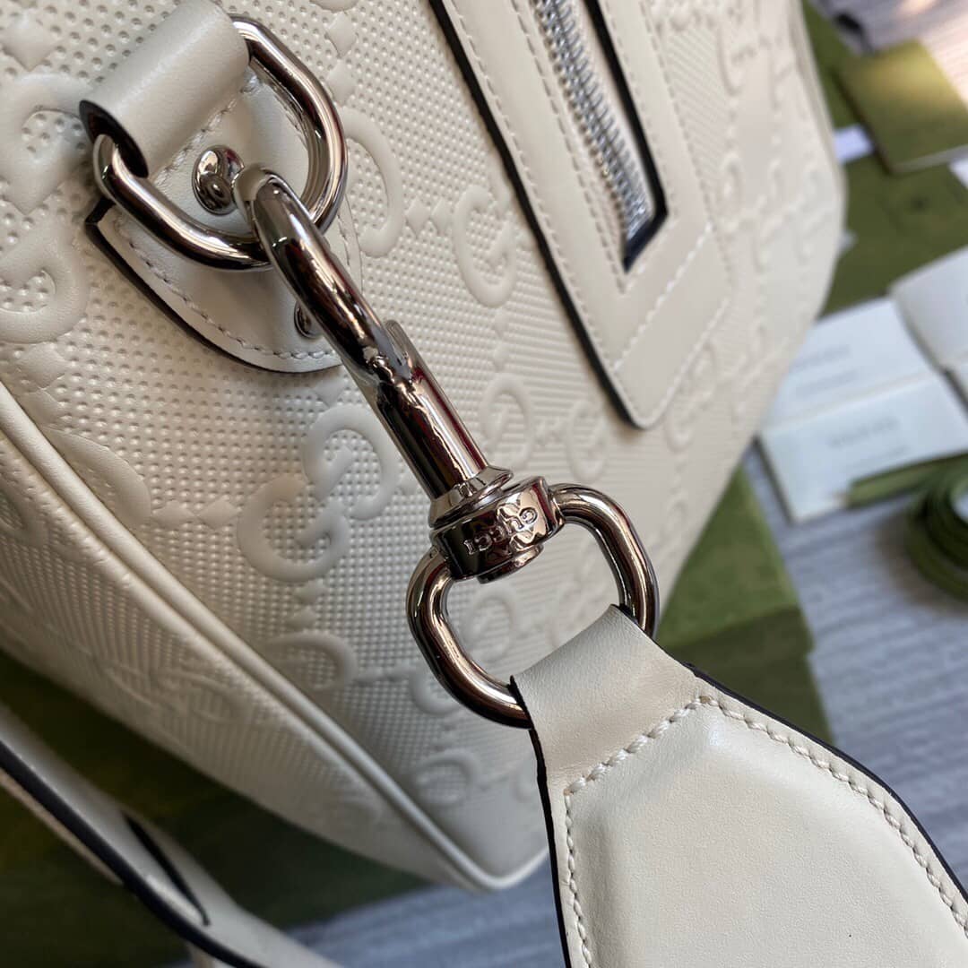 Gucci GG Embossed Perforated Leather Duffle Bag Replica White 625768