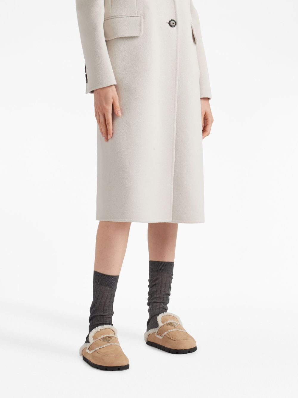 Replica Pradas triangle-logo shearling slippers