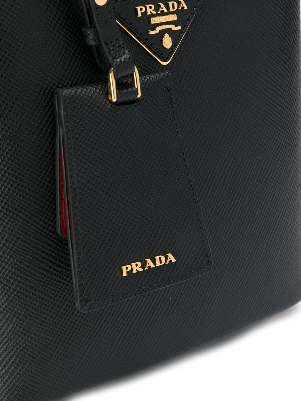 Replica Pradas logo plaque bucket bag