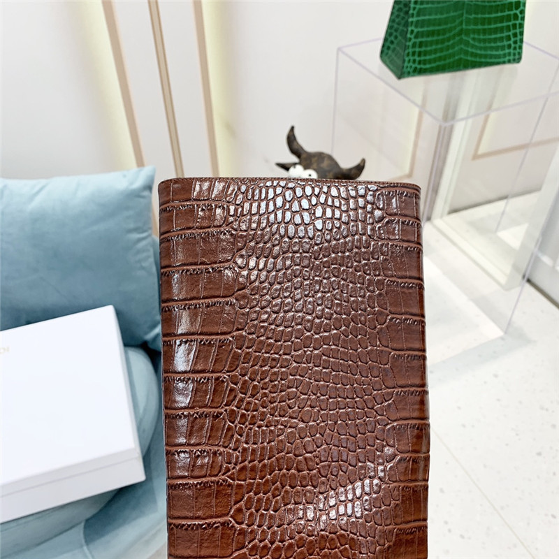 amina muaddi crocodile print boots