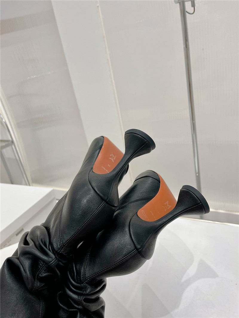 amina muaddi leather ankle boots