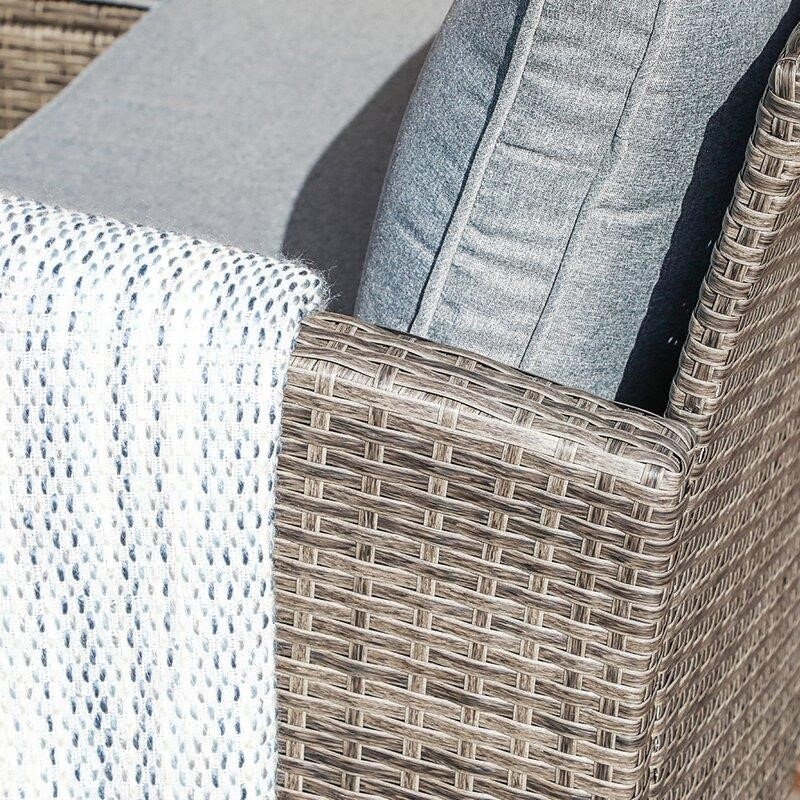 Binpal 7 Piece Rattan Sectional Seating Group with Cushions