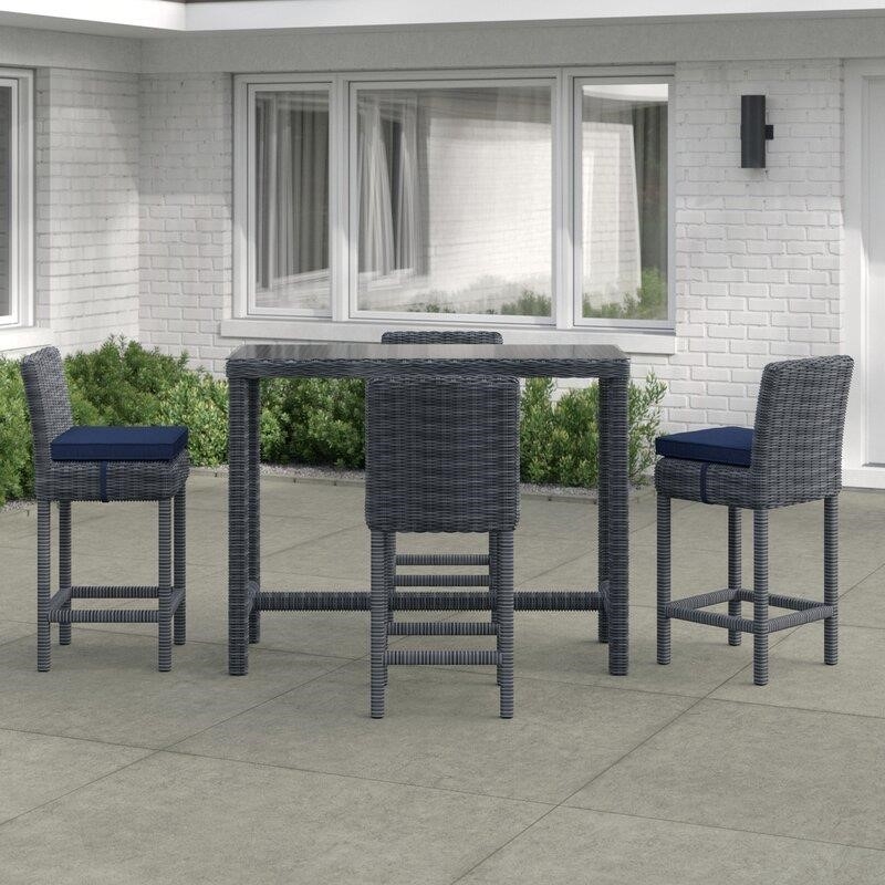 Keiran Rectangular 4 - Person 52'' Long Bar Height Dining Set with Cushions