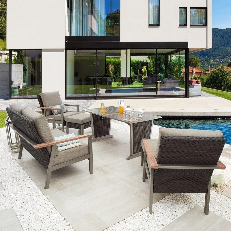 Adler Rectangular 4 - Person 56'' Long Dining Set with Cushions