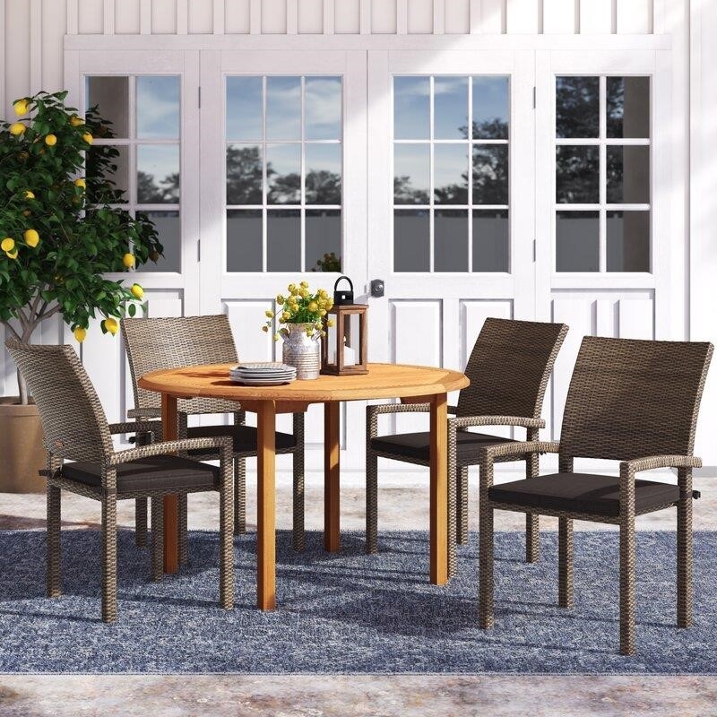 Decastro Round 4 - Person 47'' Long Dining Set with Cushions