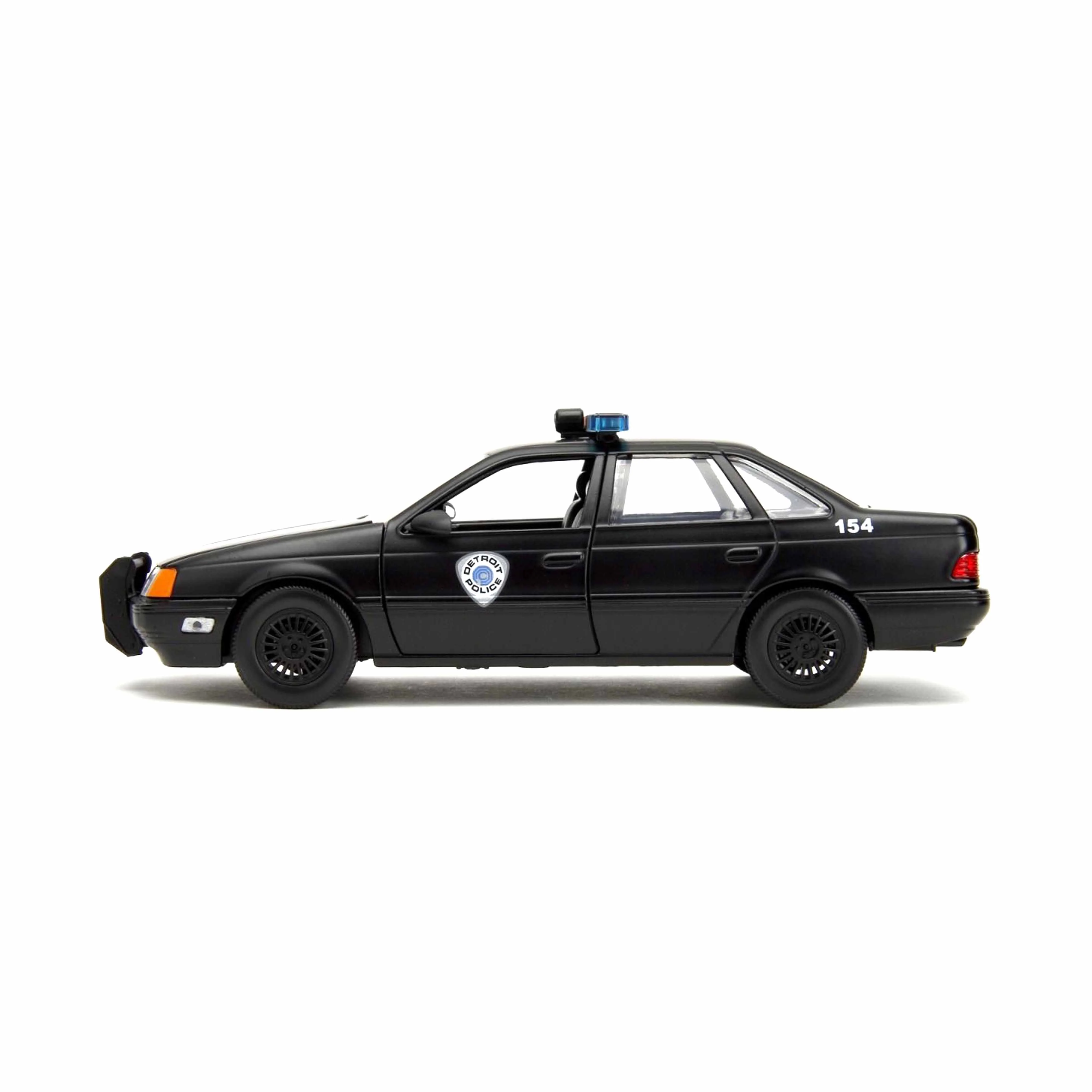 Ford Taurus noir avec figurine Robocop 1986 1/24