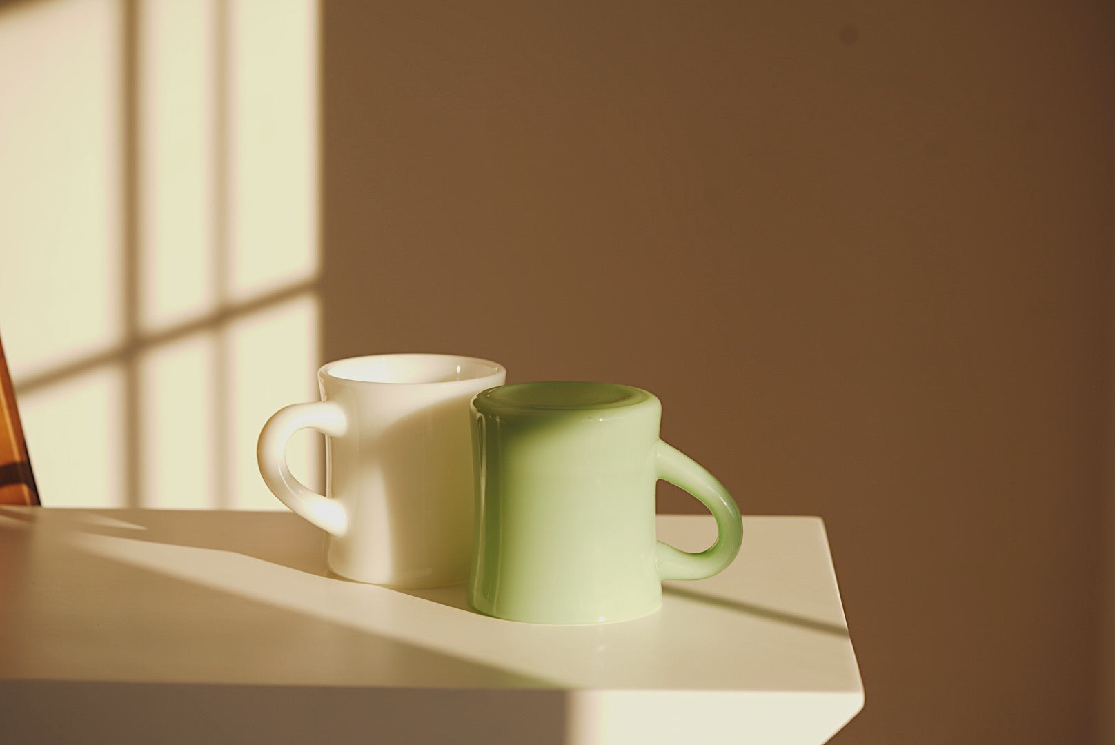 white And green milk glass mug