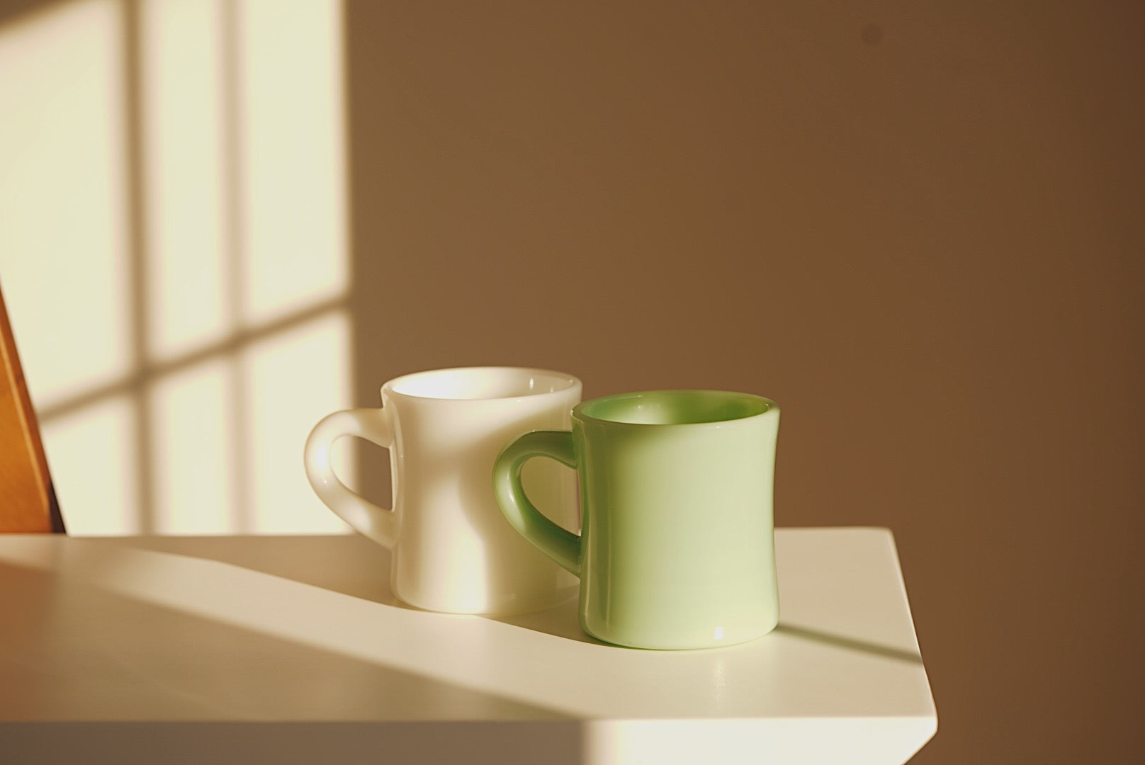 white And green milk glass mug