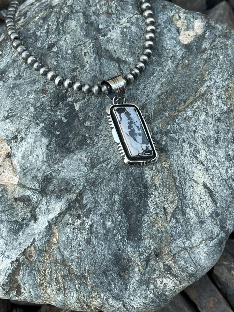 Small Hand Crafted White Buffalo Pendant with Shadow Box Trim