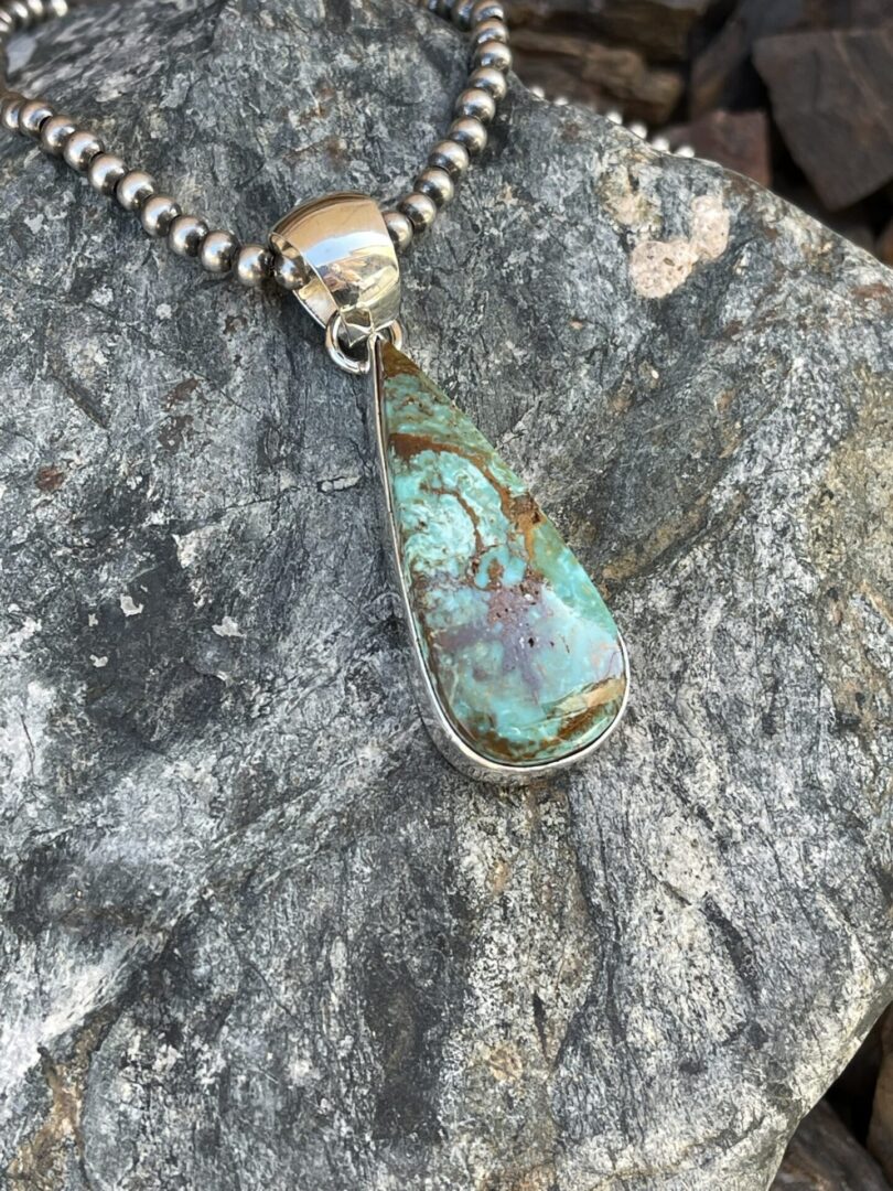 Large Tear Drop Kingman Turquoise Pendant with Plain Bezel Trim