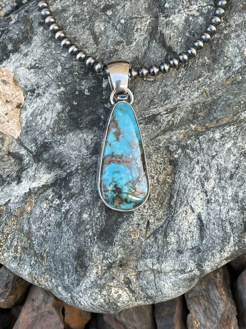 Sterling Silver Kingman Turquoise Pendant with Plain Bezel Trim