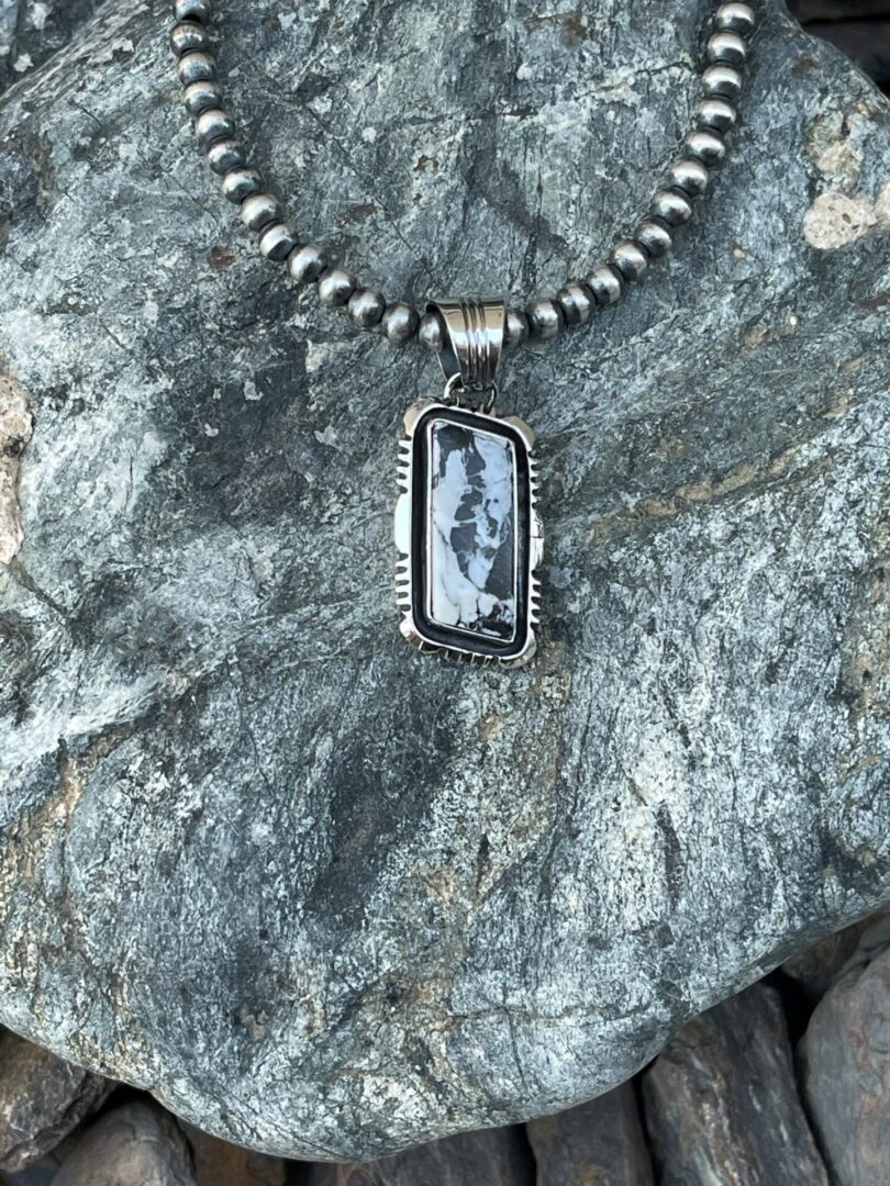 Small Hand Crafted White Buffalo Pendant with Shadow Box Trim