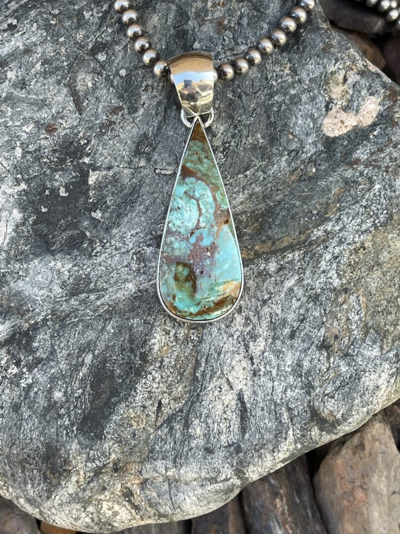 Large Tear Drop Kingman Turquoise Pendant with Plain Bezel Trim