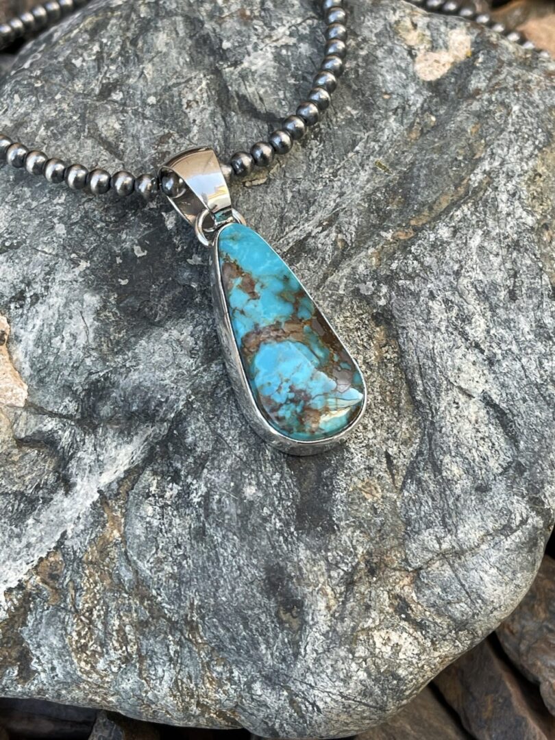 Sterling Silver Kingman Turquoise Pendant with Plain Bezel Trim