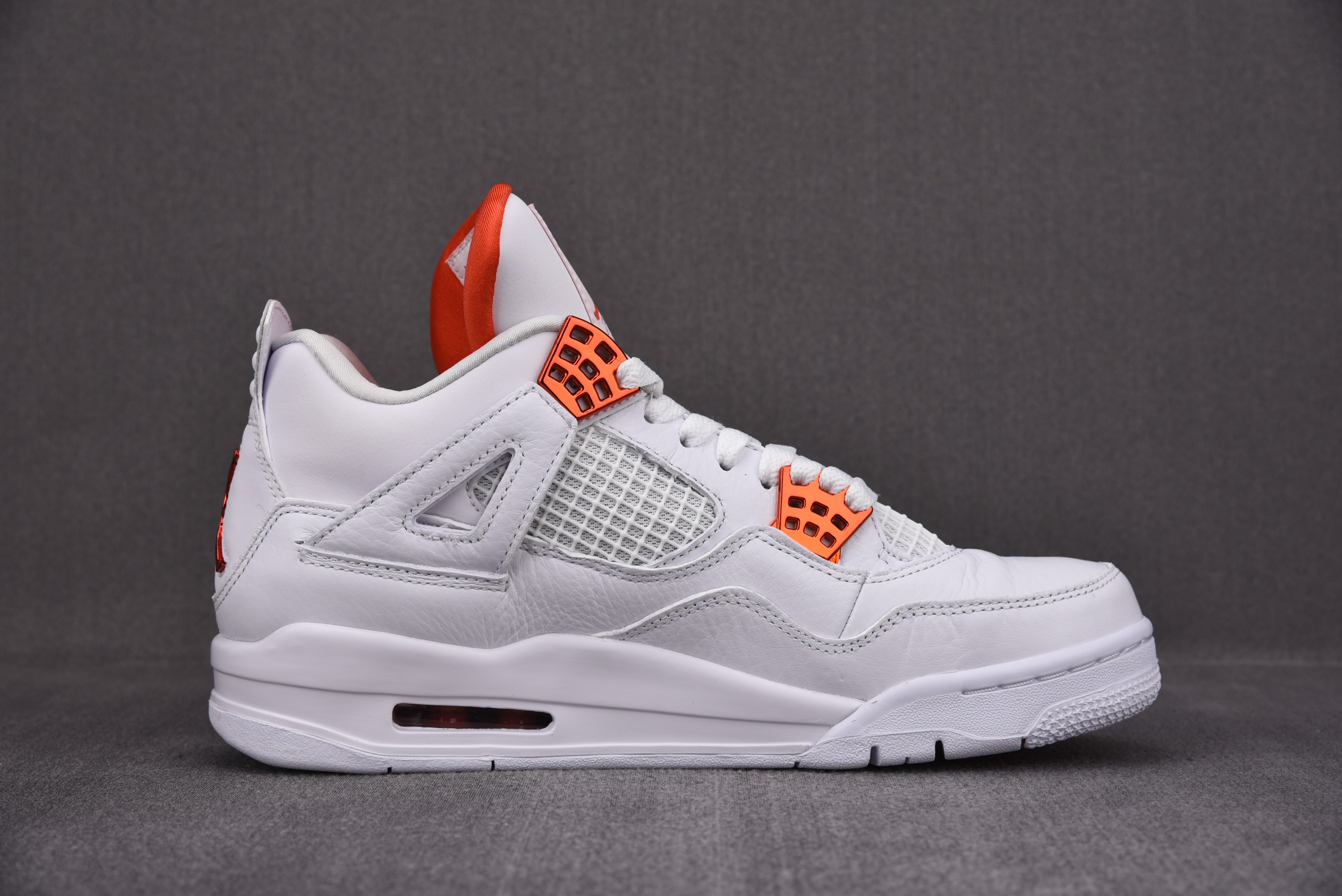 Jordan 4 Retro Metallic Orange