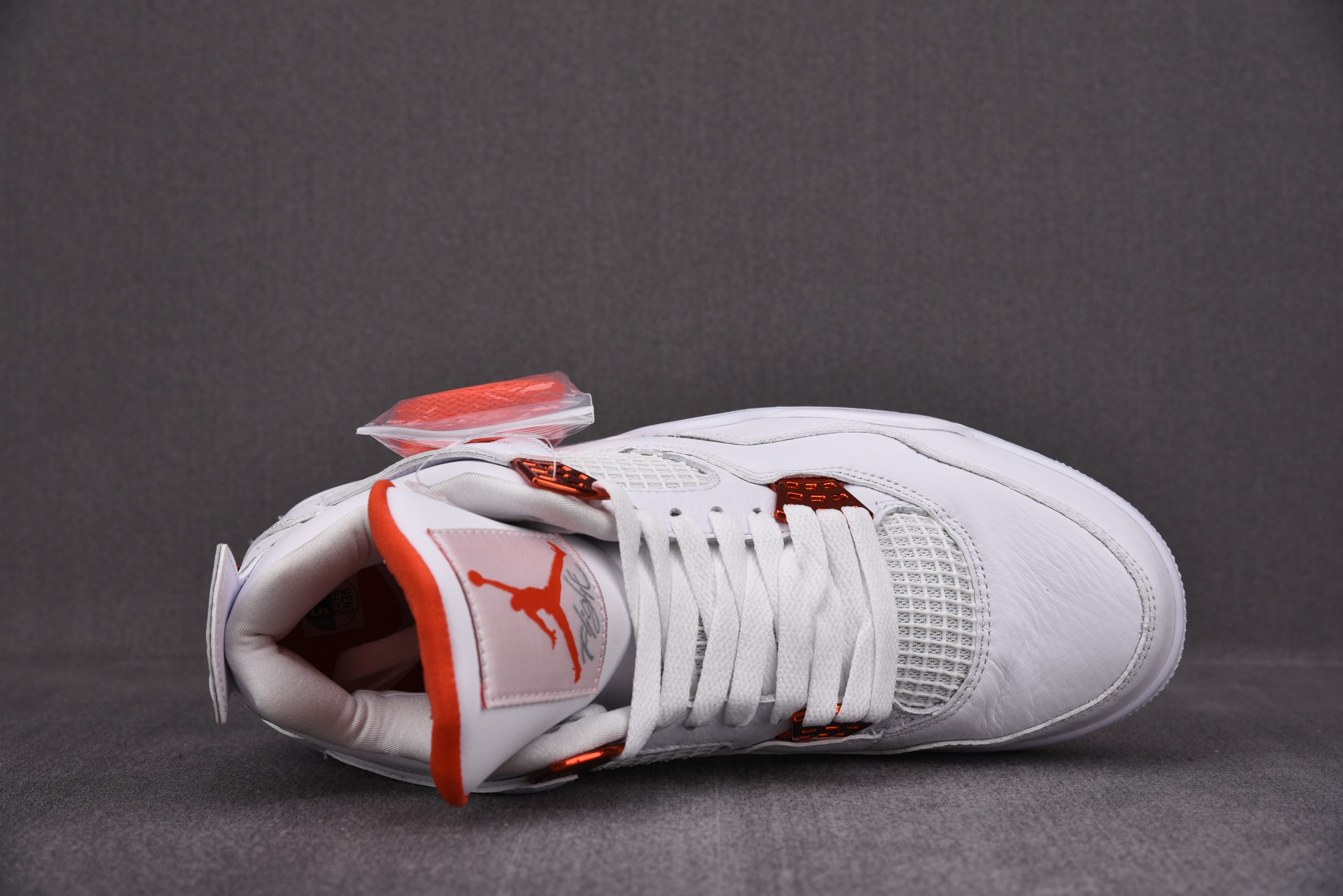 Jordan 4 Retro Metallic Orange