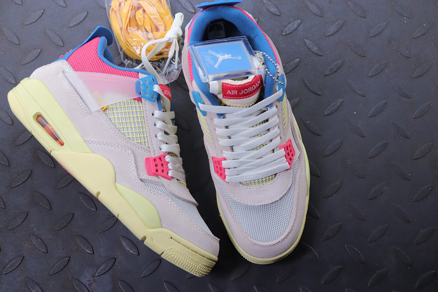 Jordan 4 Retro Union Guava Ice