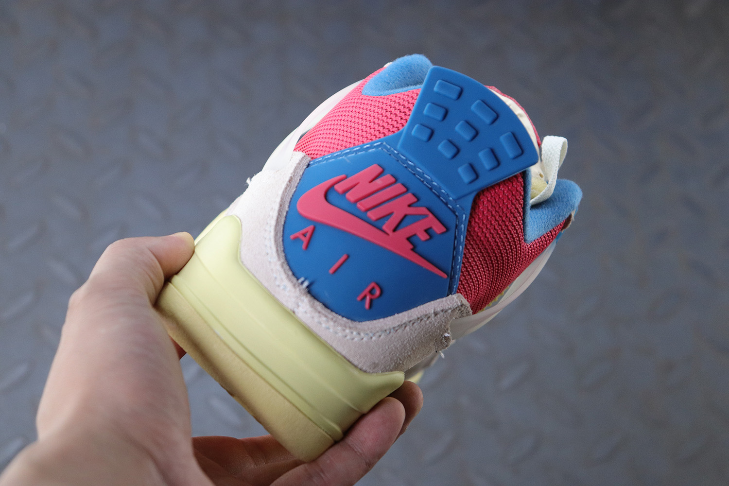 Jordan 4 Retro Union Guava Ice