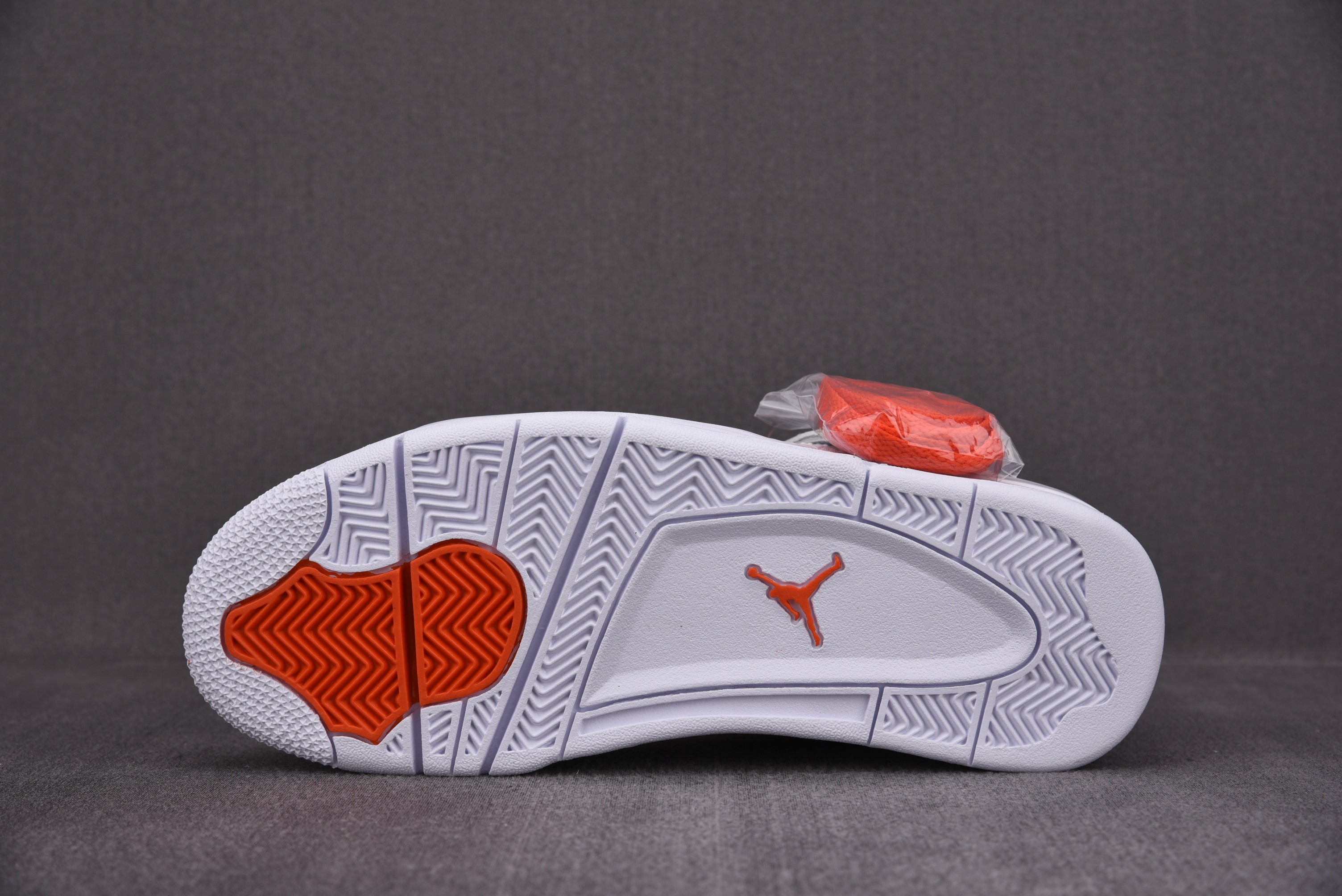 Jordan 4 Retro Metallic Orange