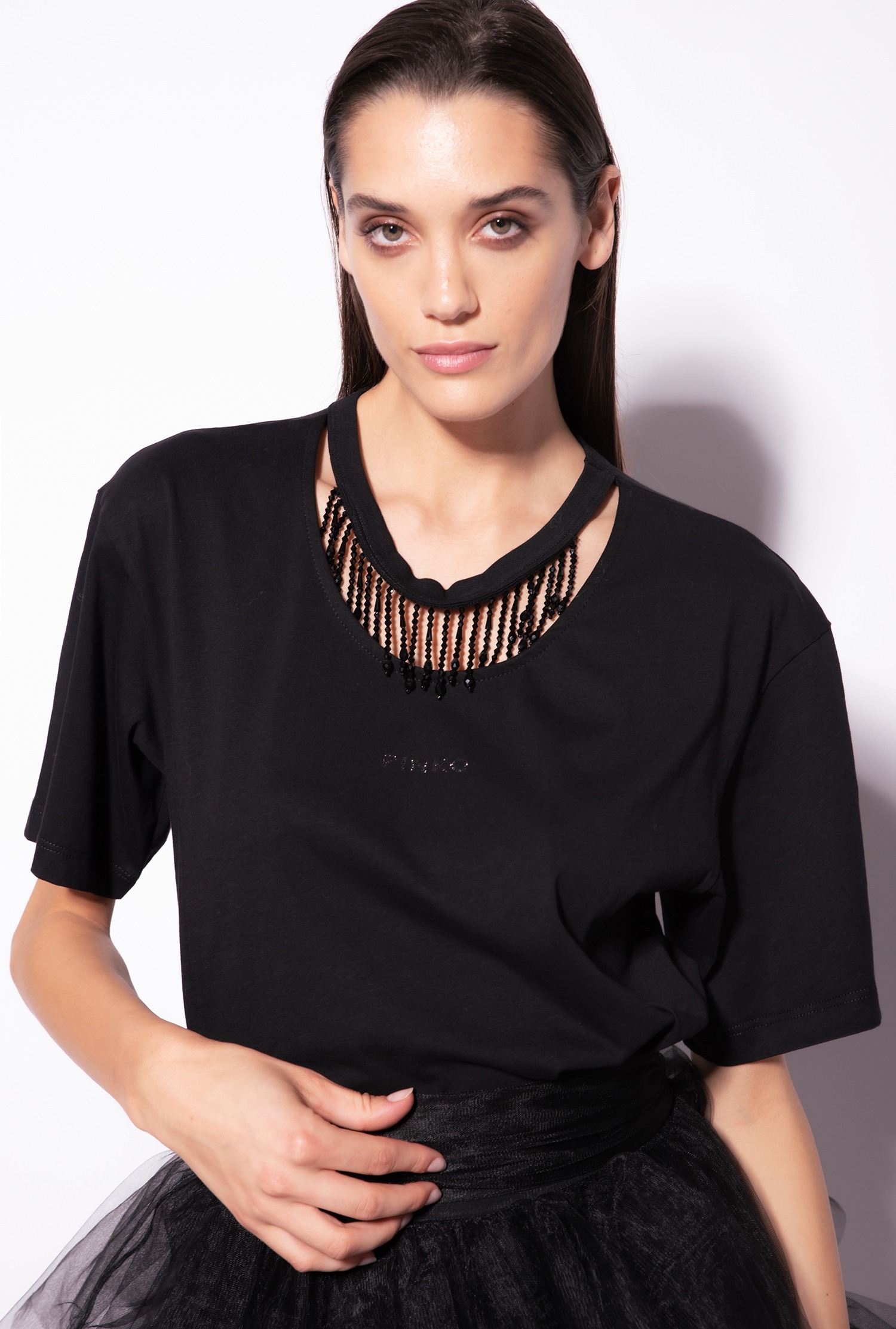T-shirt with beads on the neck