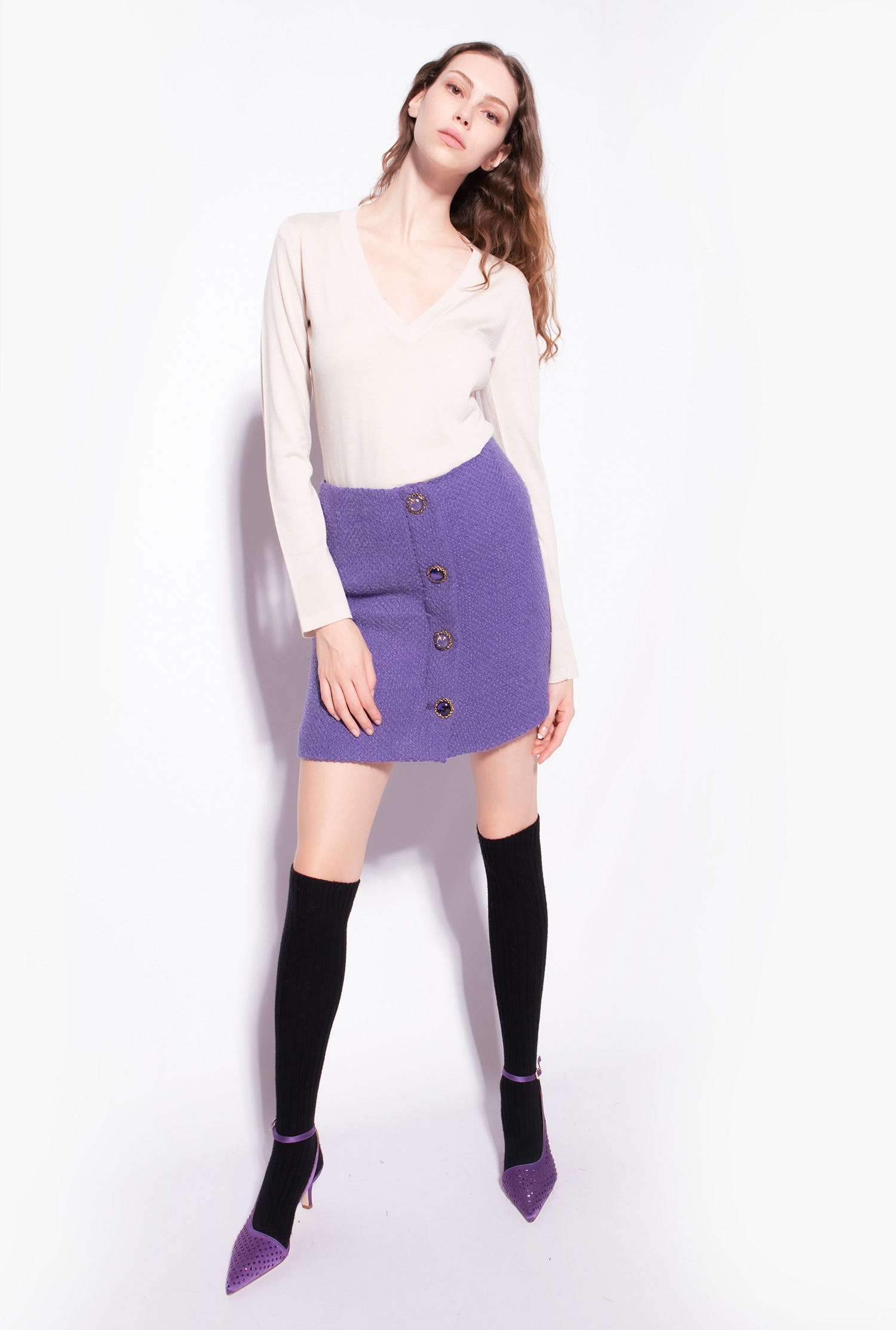 Buttoned bouclé mini skirt