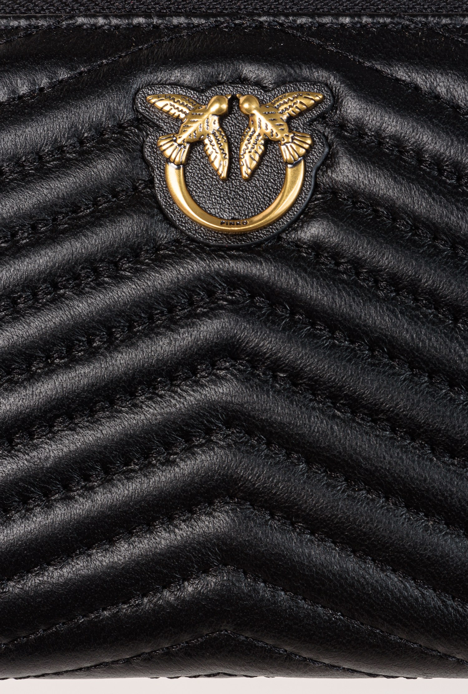 Zip-around purse in chevron-patterned nappa leather