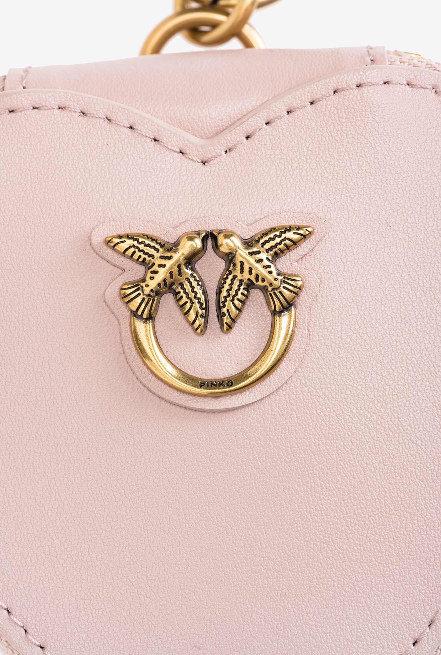 Heart-shaped charm with mirror